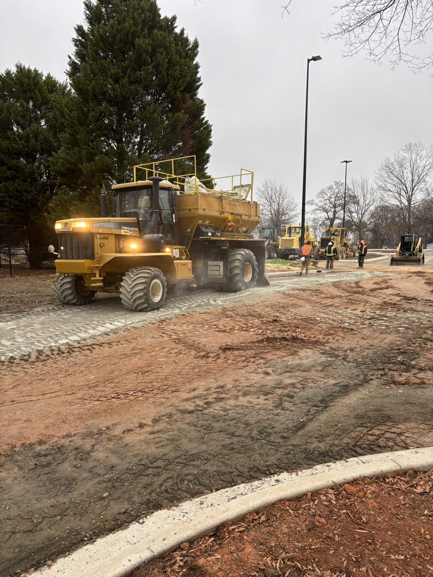 Lime spreading operation on commercial site