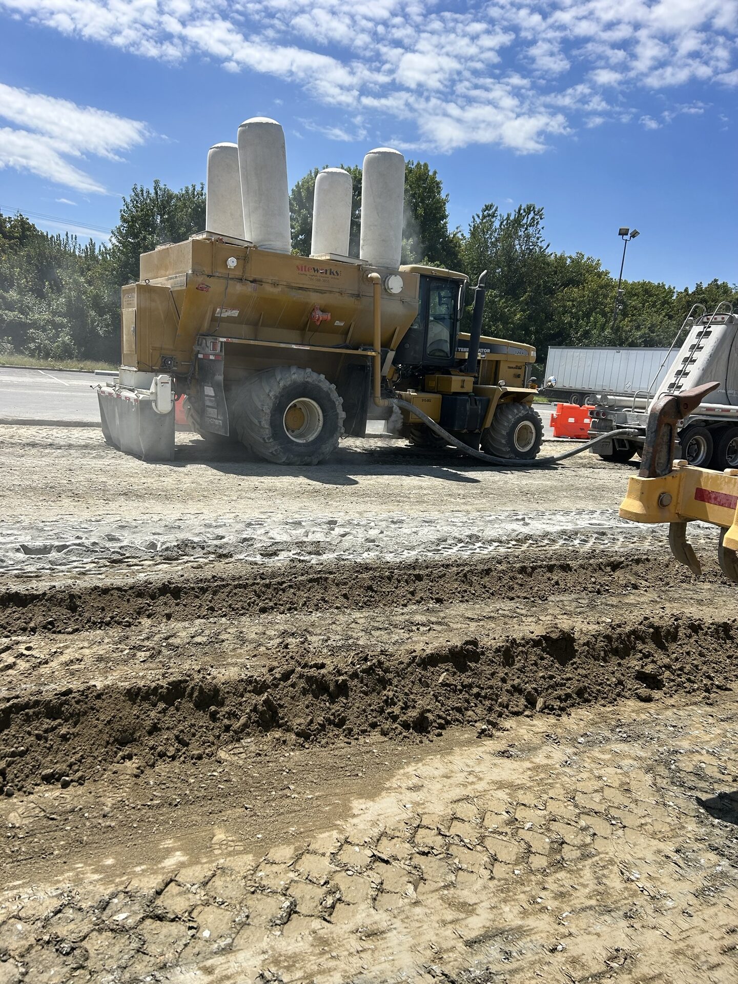 Siteworks soil stabilization Terra-Gator spreading lime treatment